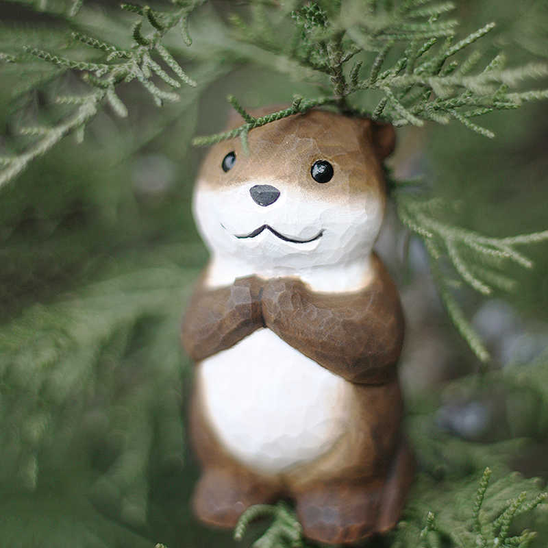 Boho Holzfigur „Otter der Wünsche“ – Handgeschnitzte Dekofigur aus Naturholz