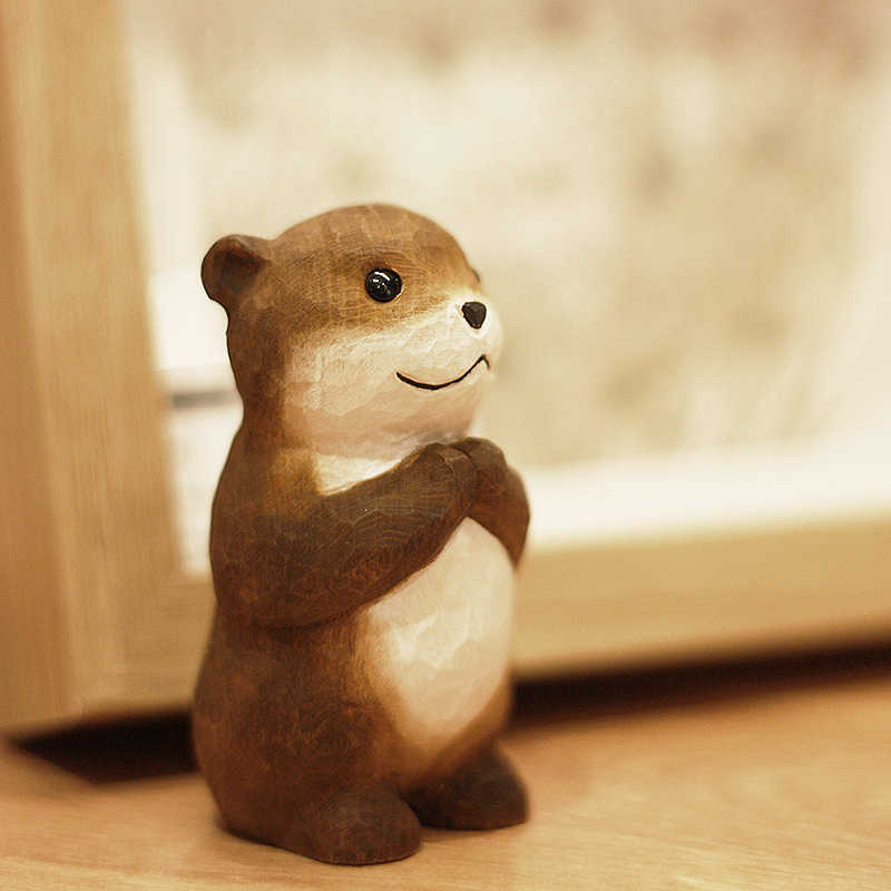 Boho Holzfigur „Otter der Wünsche“ – Handgeschnitzte Dekofigur aus Naturholz