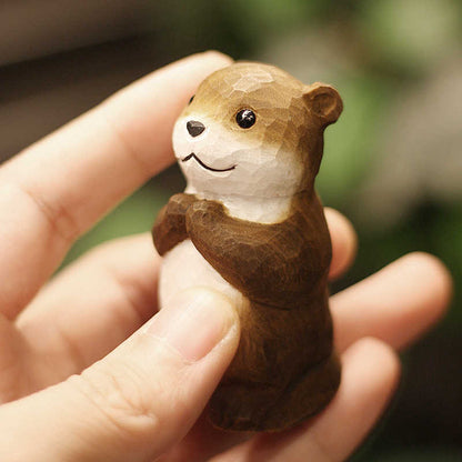 Boho Holzfigur „Otter der Wünsche“ – Handgeschnitzte Dekofigur aus Naturholz